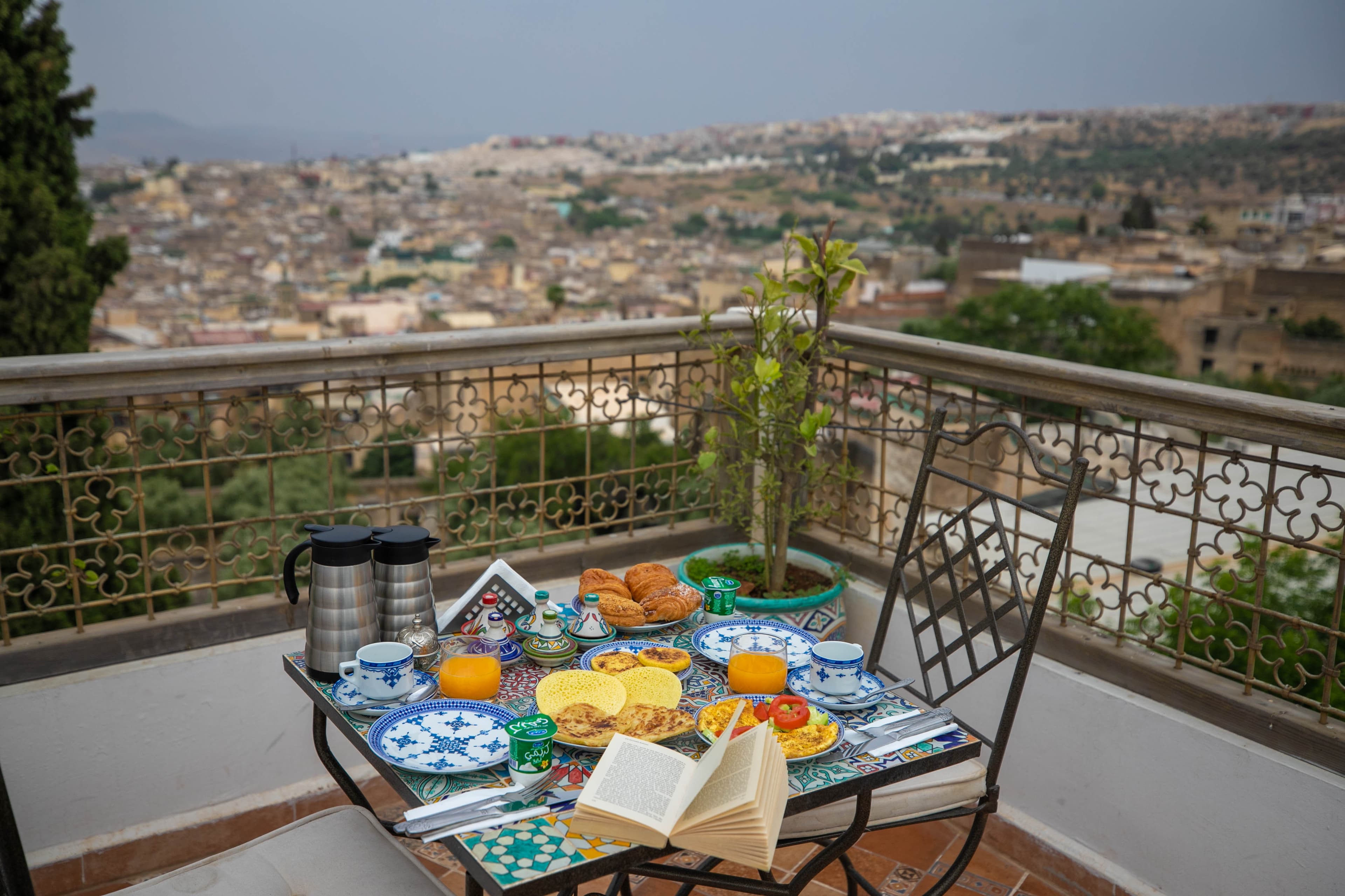 Moroccan breakfast served on the rooftop terrace at Riad Fez Mahal