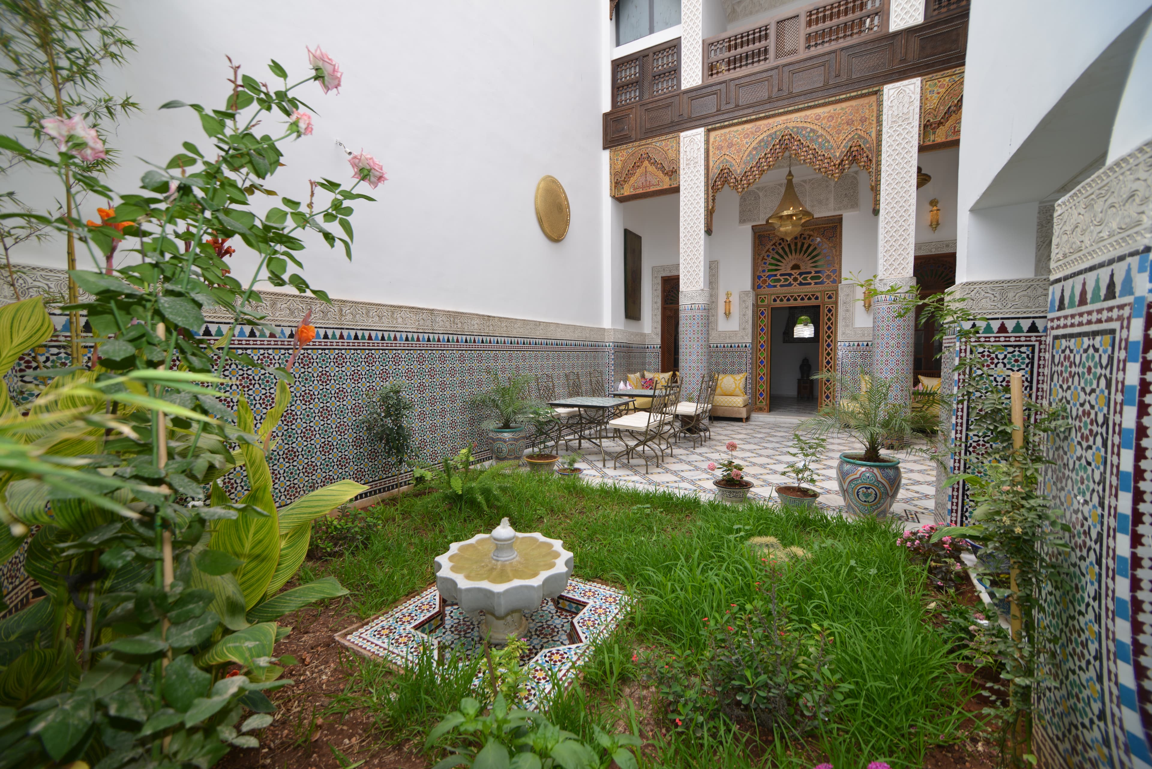 Riad Fez Mahal lobby and garden courtyard with fountain